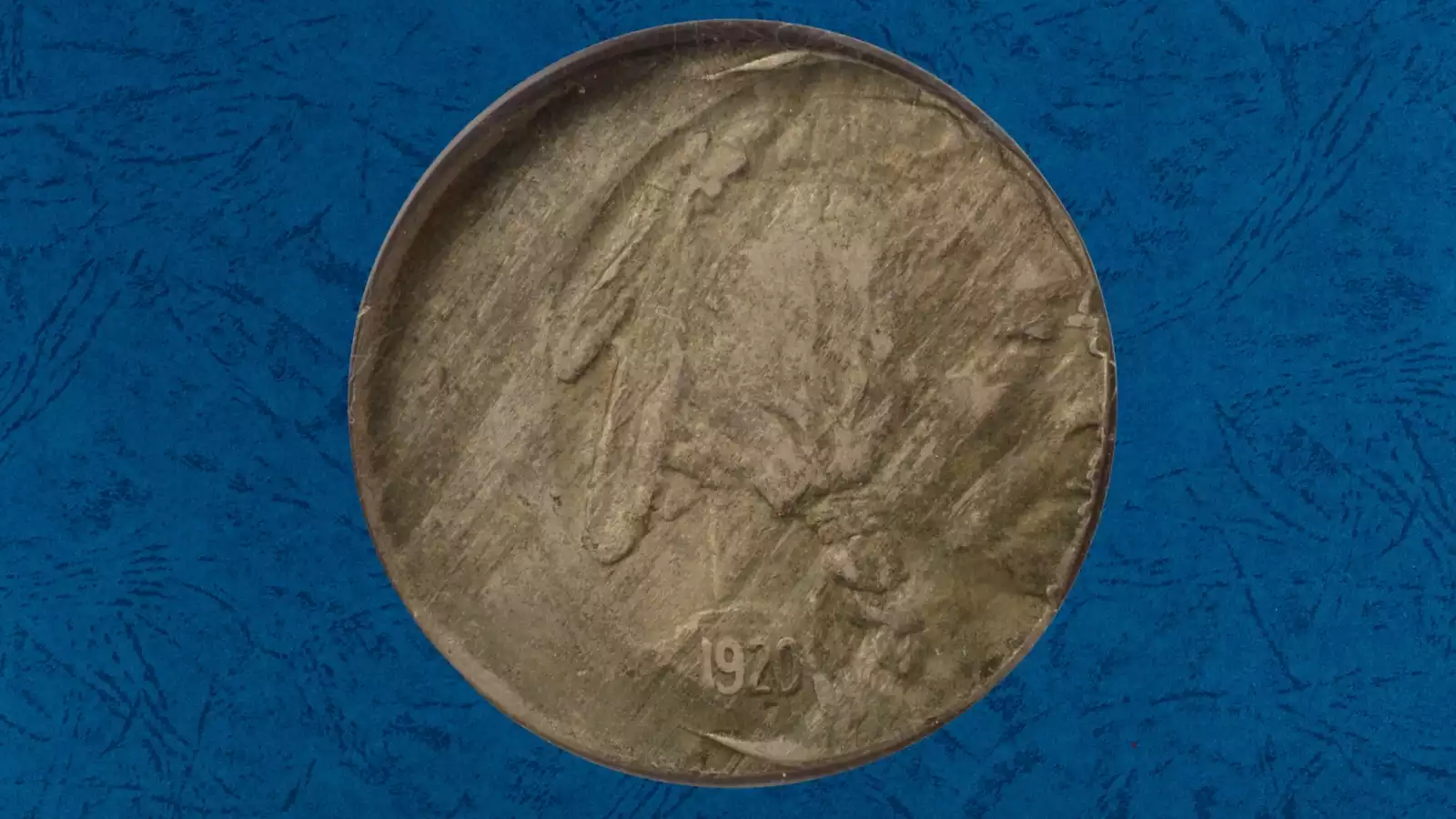 1920 Buffalo Nickel off-center strike error showing design shifted with crescent blank planchet area and date still visible